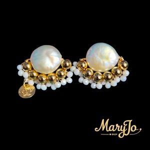 Our stylish and elegant earrings, made with genuine cultivated white pearls